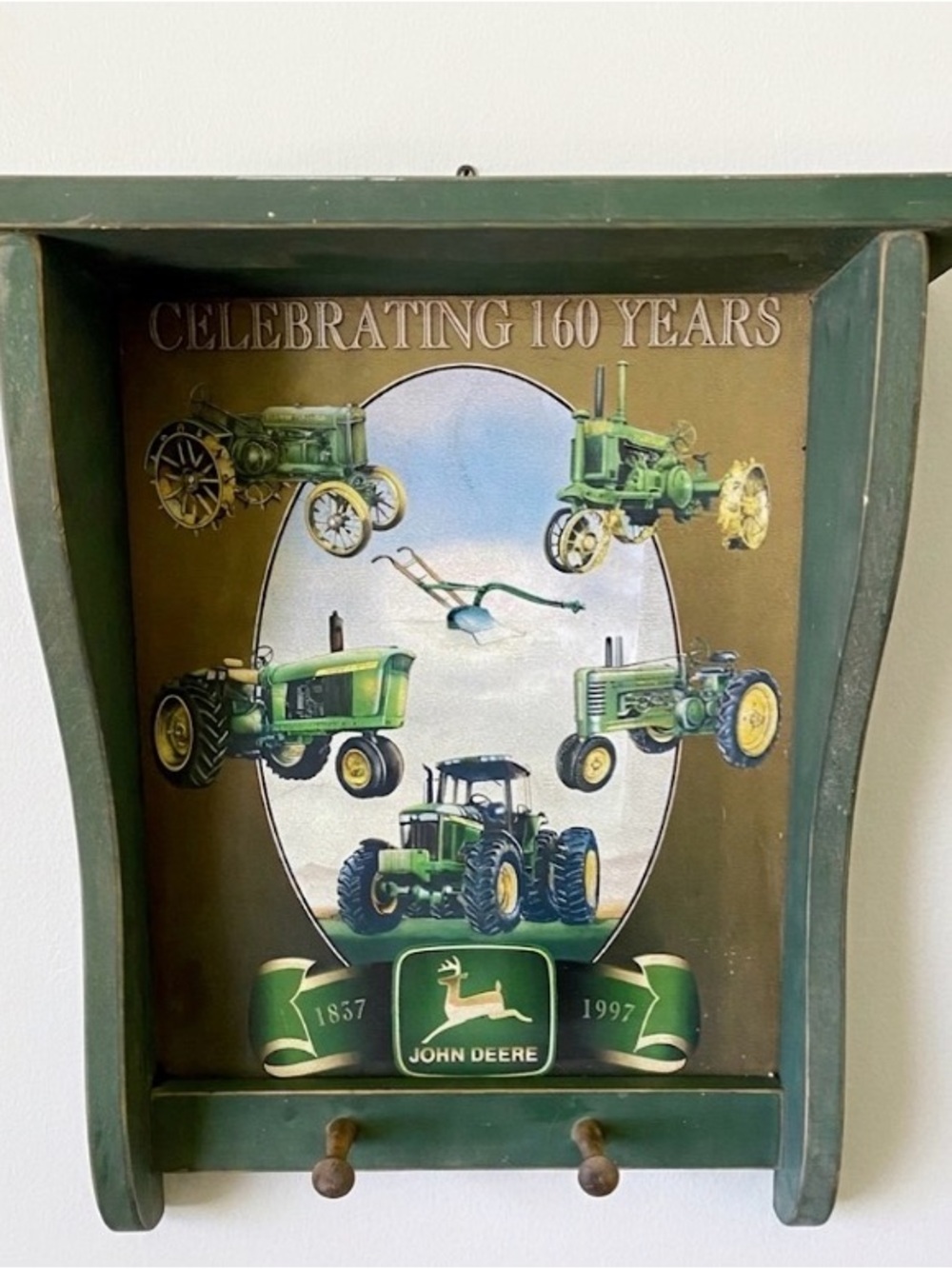 John Deere wall shelf 16 1/2 inches wide 19 inches tall